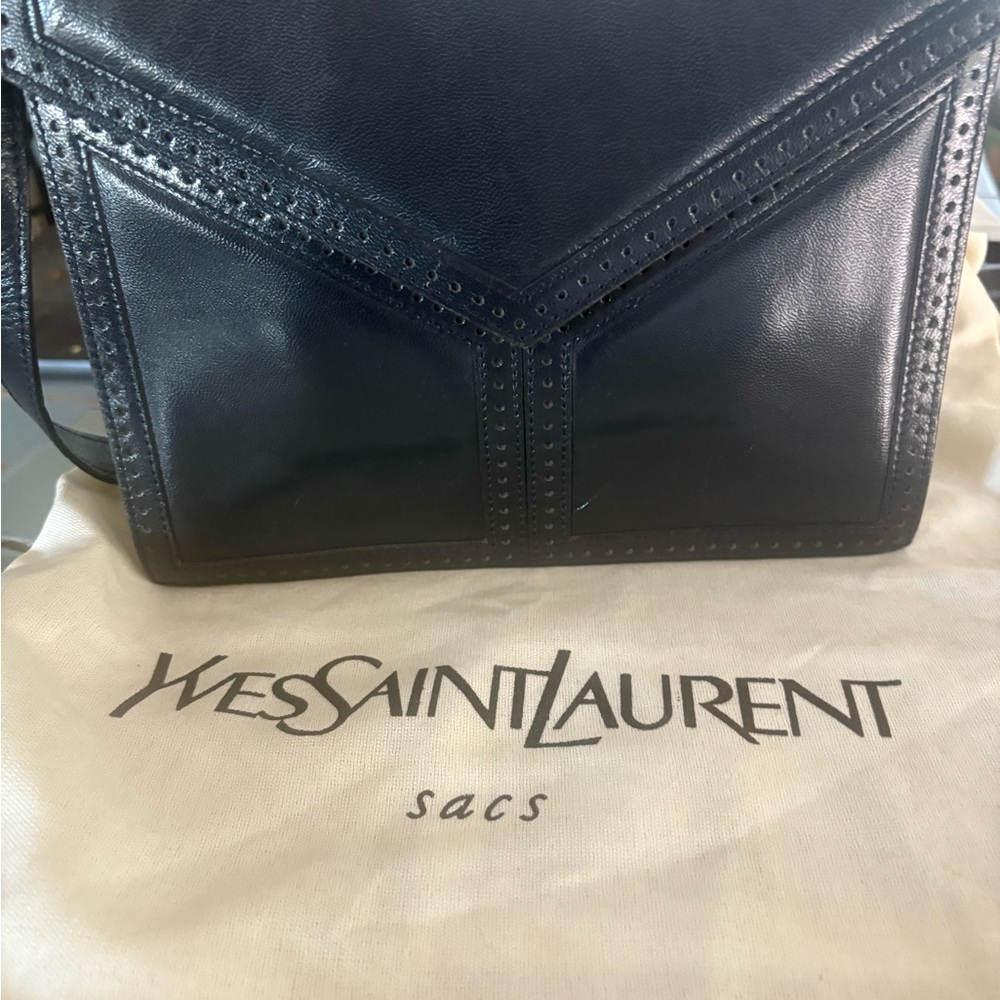 Yves Saint Laurent navy Crossbody Bag can be converted to clutch. Excellent cond